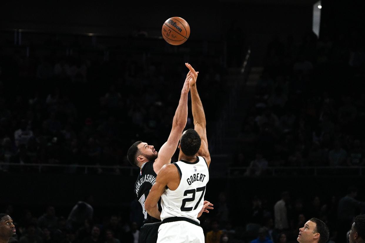 San Antonio Spurs forward Sandro Mamukelashvili and Minnesota Timberwolves center Rudy Gobert tip off last year's game at Moody Center on April 8. Chances are good rookie sensation Victor Wembanyama will handle tip duties for Friday night's Spurs-Nuggets game at Moody.