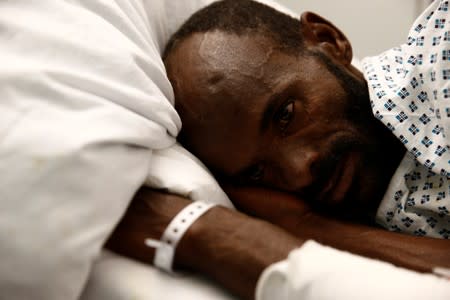 Mohammed Adam Oga, an Ethiopian migrant and the lone survivor of an eleven-day journey across the Mediterranean, speaks to Reuters from his hospital bed at Mater Dei Hospital in Tal-Qroqq