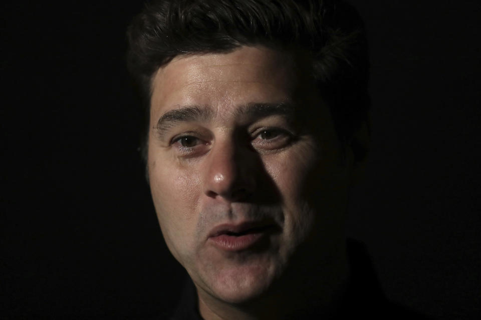 Former Tottenham's manager Mauricio Pochettino speaks during an interview in Doha, Qatar, Saturday, Dec. 21, 2019. (AP Photo/Hassan Ammar)