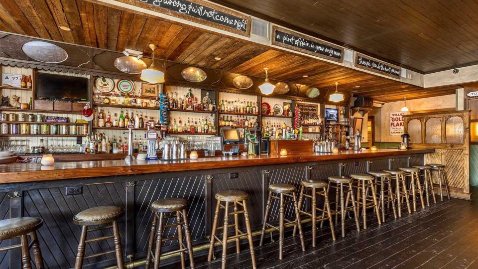 The popular bar Workman's Friend has a building value of $387,300 and land value of $568,400. The building was built in 1947.