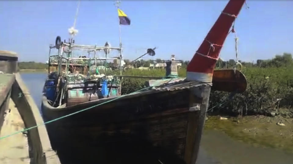 This image from video provided by Ro Mohammed Zowlal Ryz shows the boat of Jamal Hussein, who was captaining the vessel when it sank in rough seas south of Bangladesh on Dec. 7, 2022, carrying around 180 Rohingya refugees. Hussein shot the video and shared it with prospective passengers around Bangladesh's Rohingya refugee camps. (Jamal Hussein via AP)