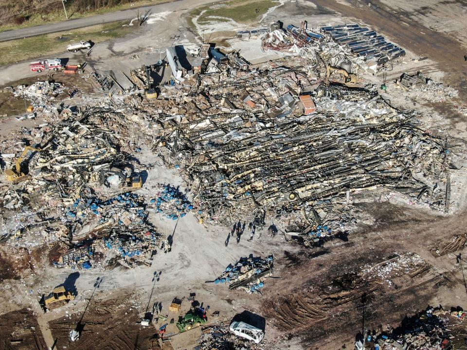 An aerial photo made with a drone shows the destruction of the Mayfield Consumer Products candle factory after tornadoes moved through the area leaving destruction and death across six states, in Mayfield, Kentucky, USA, 12 December 2021 (EPA)