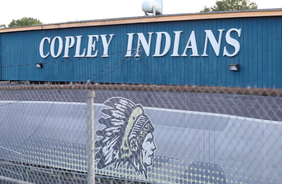 The profile of an Indian in a headdress and the Name Copley Indians is seen on the press box of the football stadium at Copley High School.