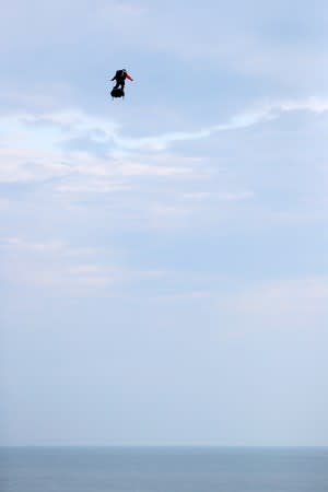 French inventor Franky Zapata takes off on a Flyboard for a second attempt to cross the English channel from Sangatte to Dover, in Sangatte