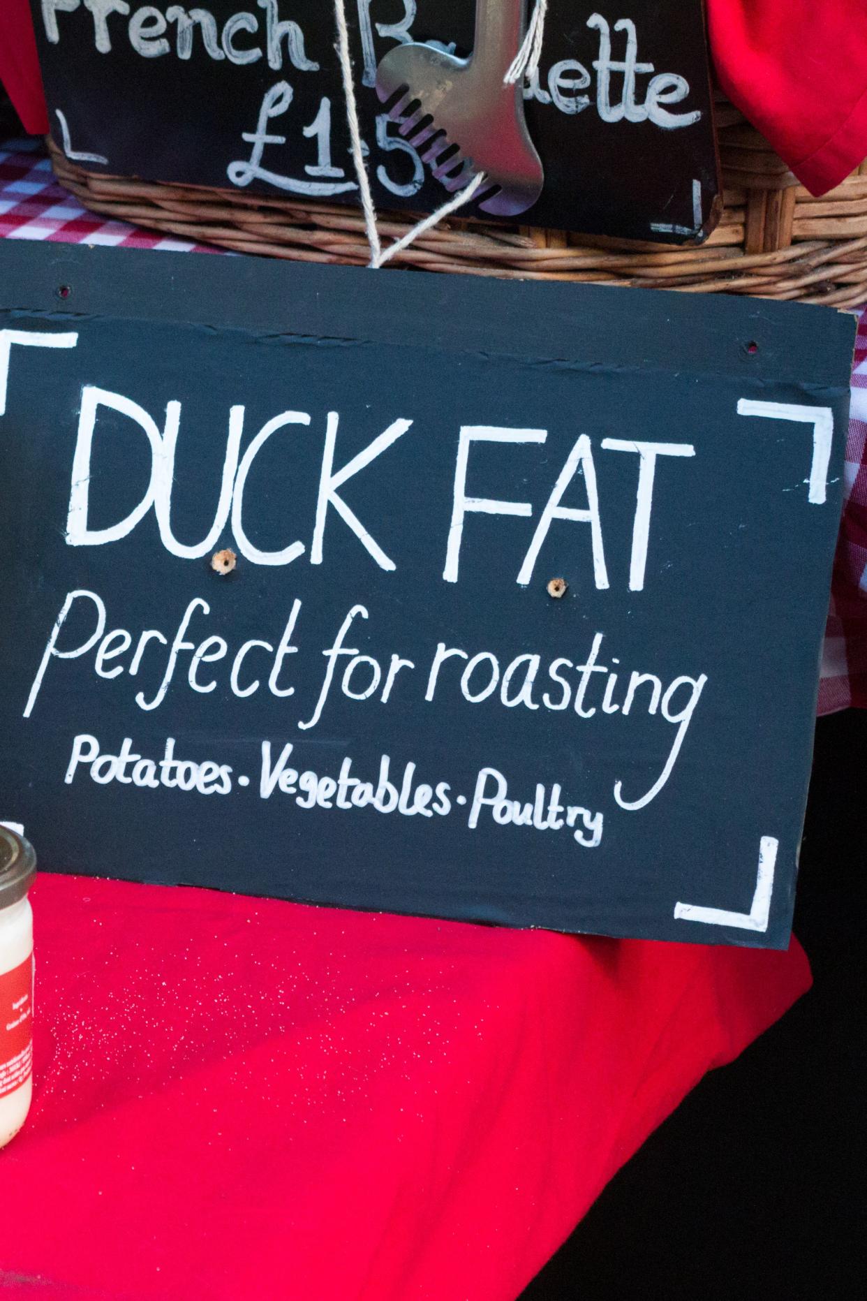 duck fat sign at borough market, london