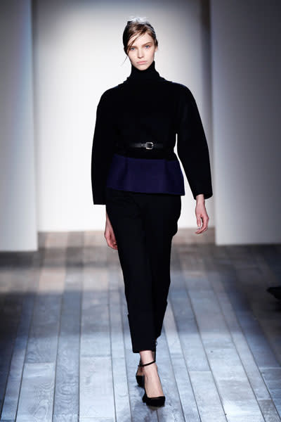 <b>Victoria Beckham AW13 at New York Fashion Week </b><br><br>Cinch in your waist with a skinny belt like this model.<br><br>Image © Getty