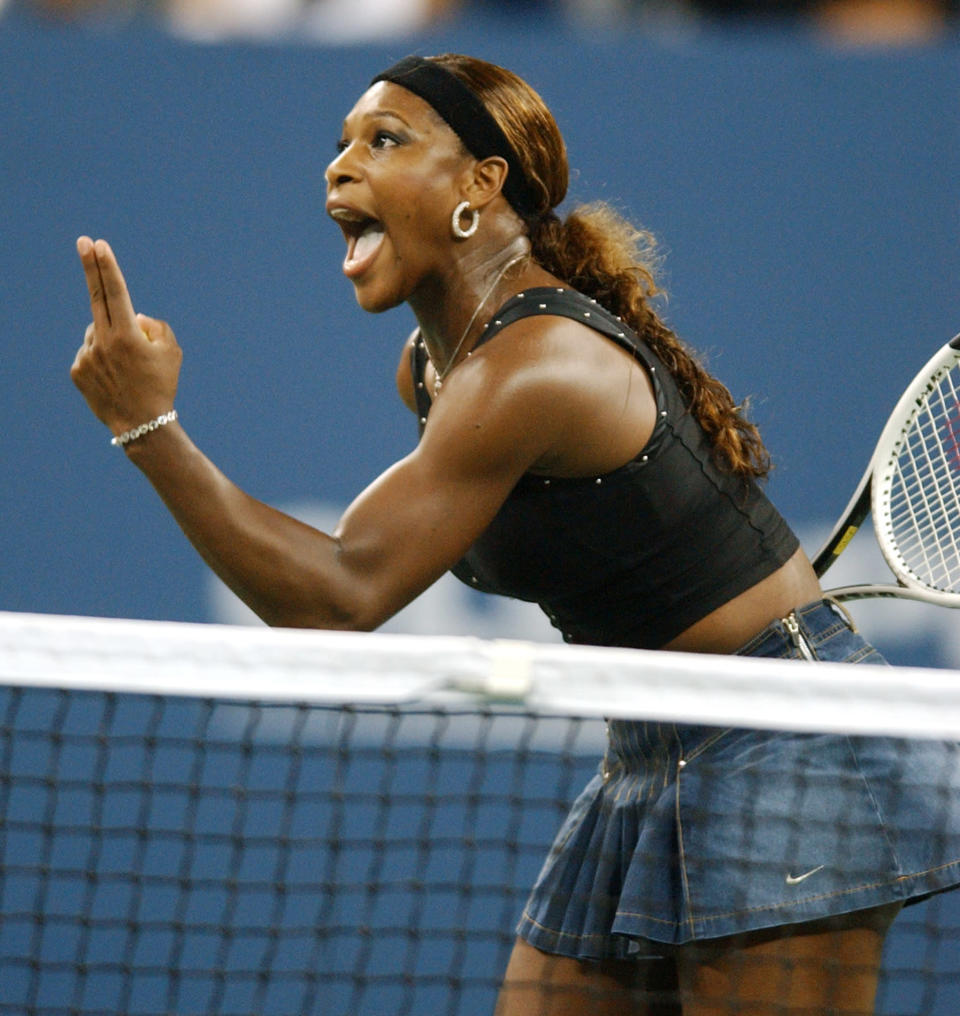 Serena Williams, of the United States, questions a call during her match with Jennifer Capriati, of the United States, at the U.S. Open tennis tournament in New York, Tuesday, Sept. 7, 2004. (AP Photo/ Bill Kostroun)