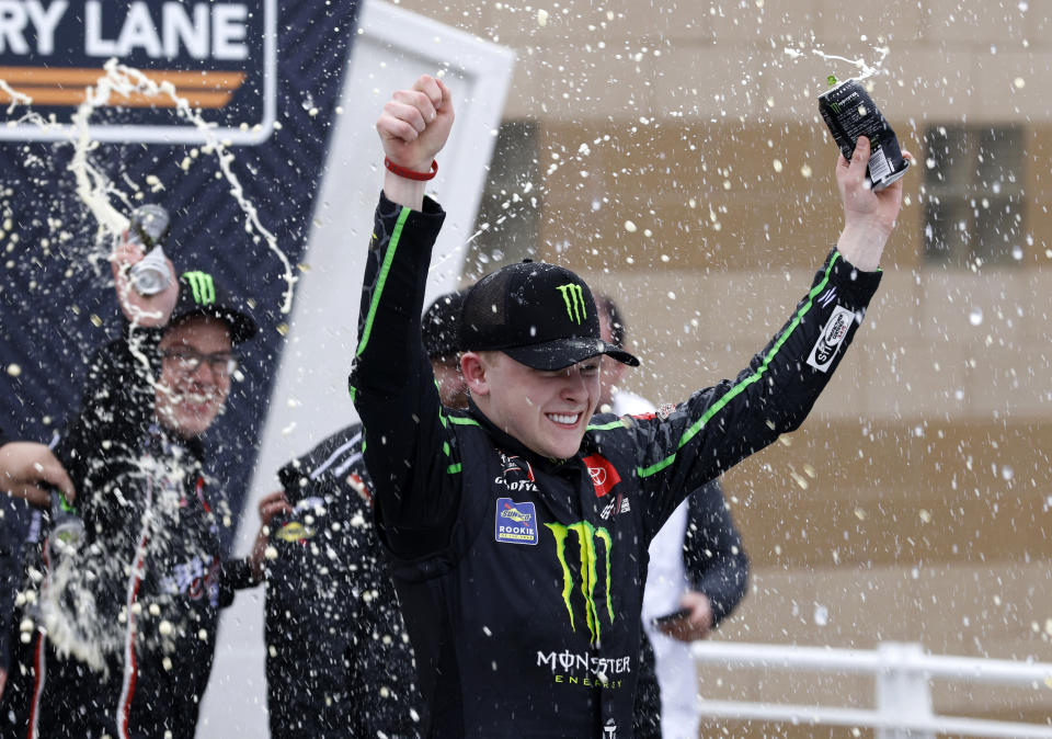 Ty Gibbs celebrates after winning an Xfinity Series auto race at Kansas Speedway in Kansas City, Kan., Saturday, Oct. 23, 2021. (AP Photo/Colin E. Braley)