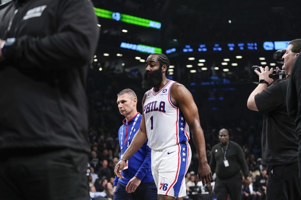 Philadelphia 76ers' James Harden (1) leaves the court after being ejected for a flagrant foul during the second half of Game 3 against the Brooklyn Nets during the first round of the NBA basketball playoffs Thursday, April 20, 2023, in New York. (AP Photo/Frank Franklin II)