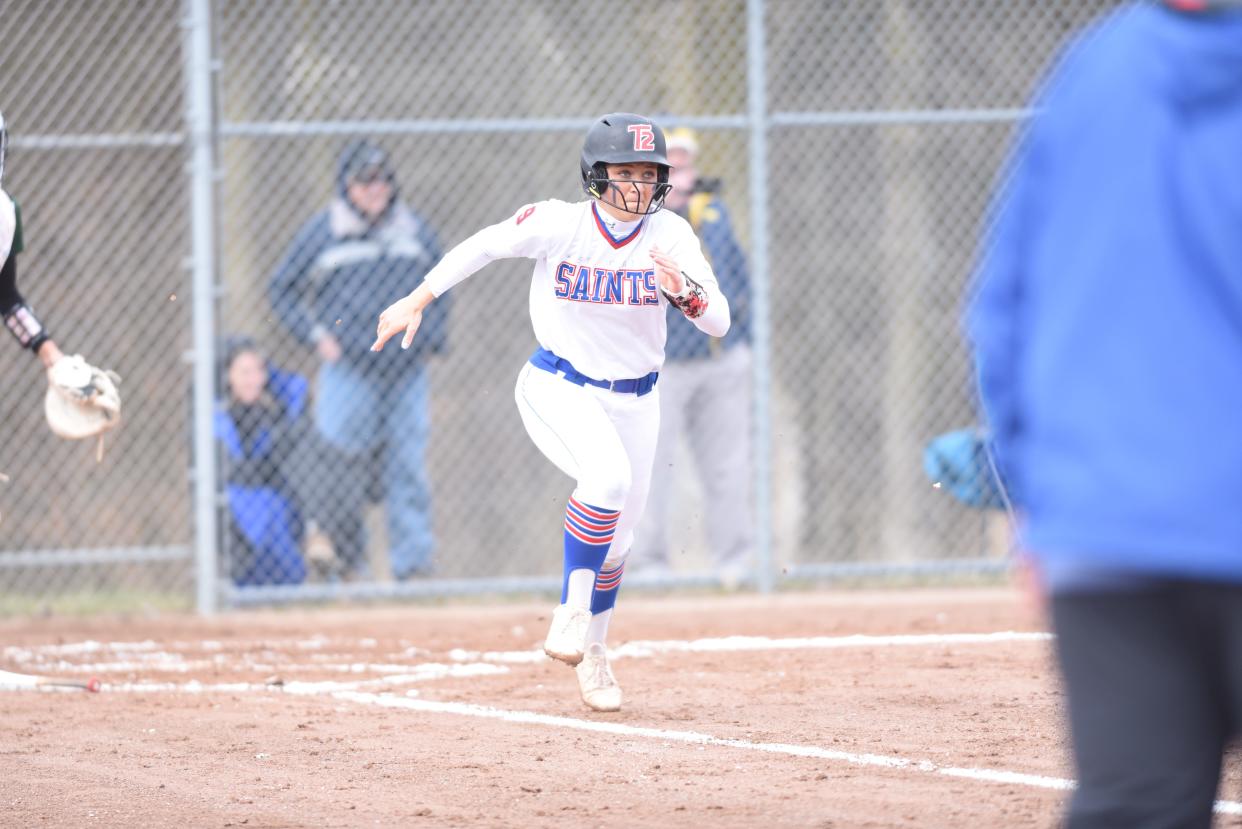 St. Clair's Madison Cole runs to first base during a game earlier this season.