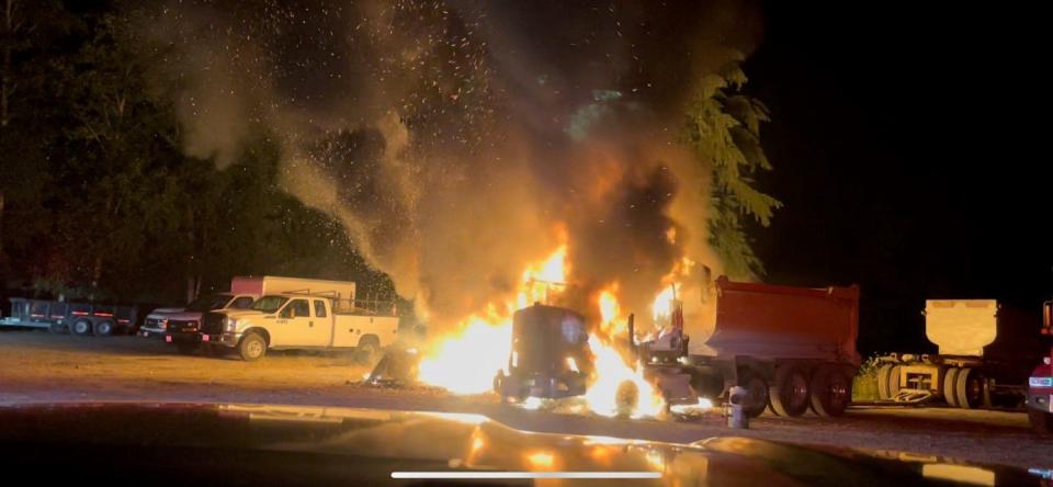 A view of the dump truck on fire at Whitworth Excavating.