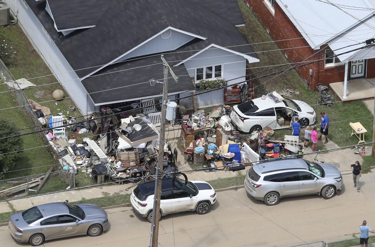 Residents of Whitesburg, Ky. are beginning to return to the small city in the eastern part of the state on Saturday, July 30, 2022. The area is beginning to asses the damage after historic rain brought catastrophic flooding to the area killing more than two dozen people.