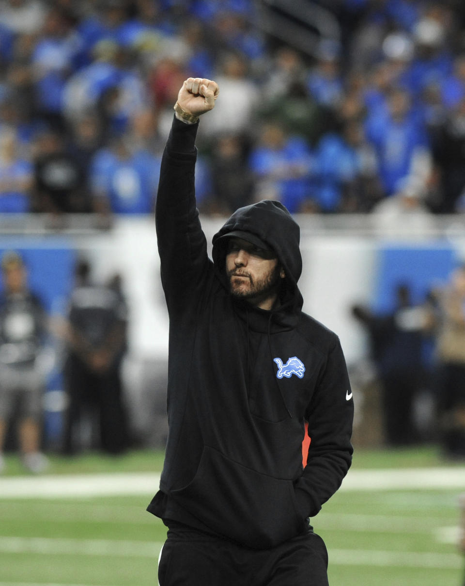 Eminem acknowledges the crowd at an NFL football game between the Detroit Lions and New York Jets in Detroit, Monday, Sept. 10, 2018. (AP Photo/Jose Juarez)