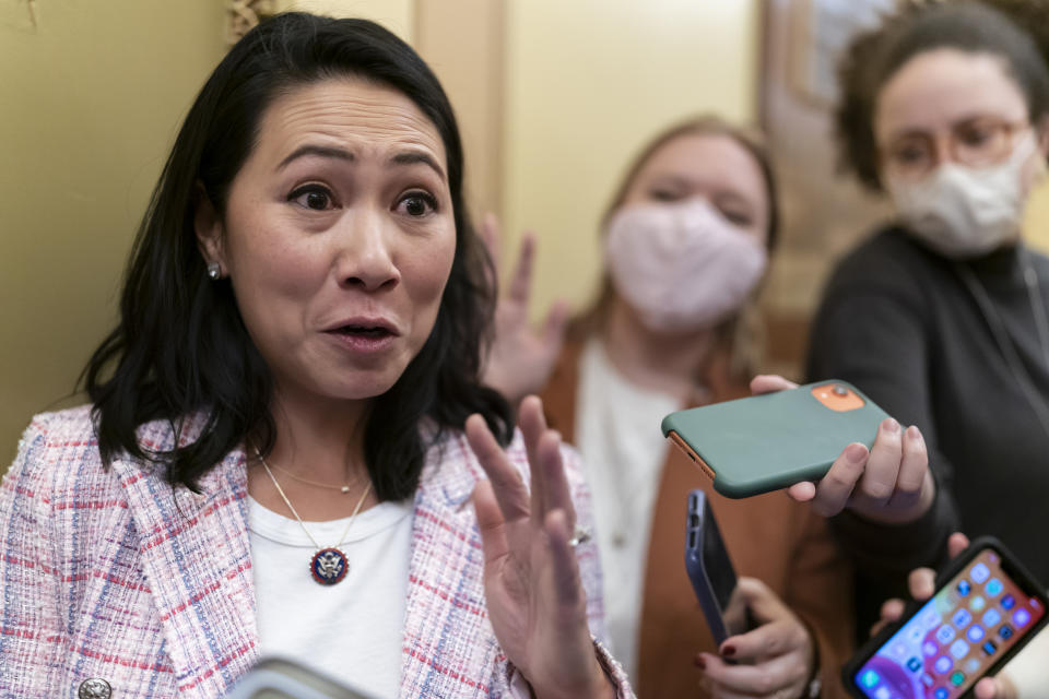 Rep. Stephanie Murphy, D-Fla., speaks to reporters outside the House chamber during votes on President Joe Biden's domestic agenda, at the Capitol in Washington, Thursday, Nov. 18, 2021. (AP Photo/J. Scott Applewhite)