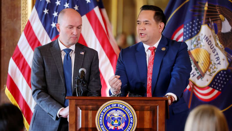 Gov. Spencer Cox is joined at the podium by Attorney General Sean Reyes as they take questions about plans to address the harmful impacts social media is having on the mental health and well-being of Utah youth in the Gold Room at the Capitol on Jan. 23, 2023.