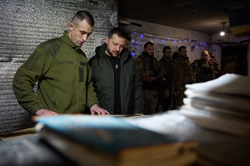 Ukrainian President Volodymyr Zelensky visits the embattled front-line town of Avdiivka -/Ukrainian Presidency/dpa