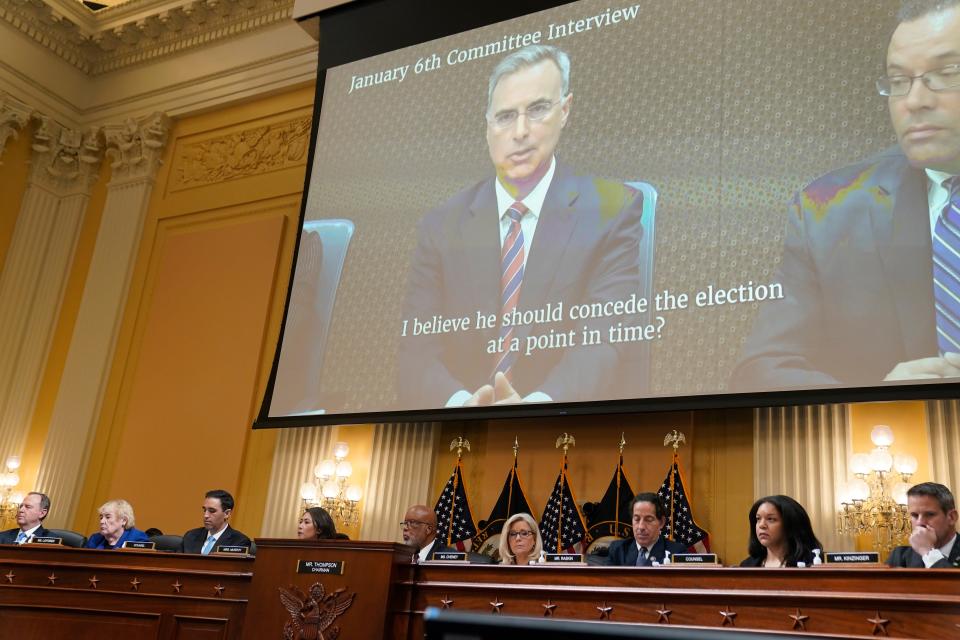 Pat Cipollone, former White House counsel, testifies on video projected July 12 during a public hearing of the House committee investigating the Jan. 6 attack on the U.S. Capitol.
