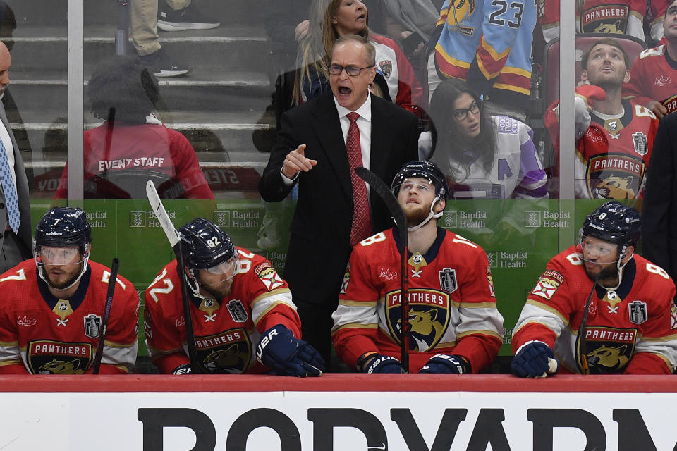 Florida Panthers head coach Paul Maurice. center top, reacts during the second period of Game 2 of the NHL hockey Stanley Cup Finals against the Edmonton Oilers, Monday, June 10, 2024, in Sunrise, Fla. (AP Photo/Michael Laughlin)