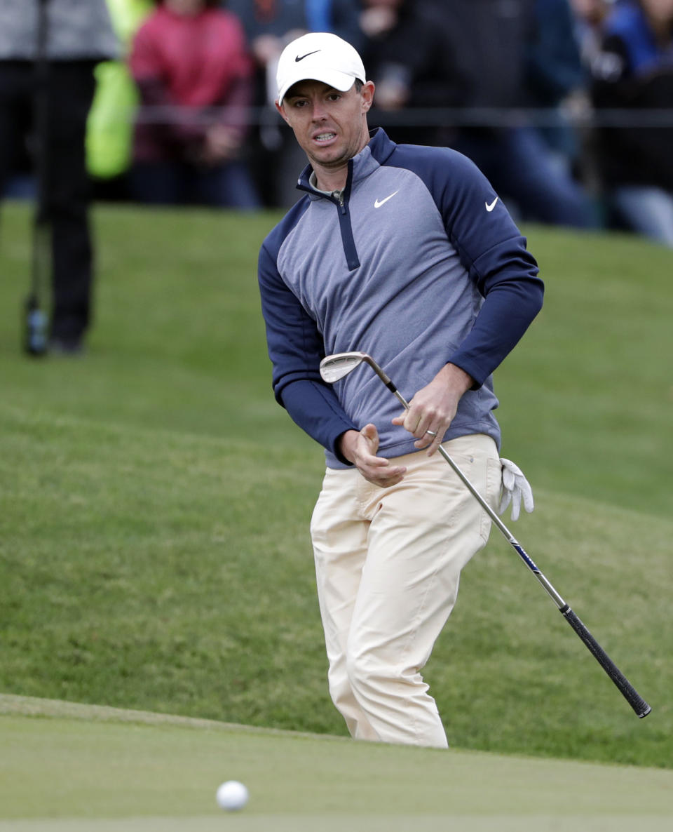 Rory McIlroy, of Northern Ireland, watches his shot on the ninth green during the final round of The Players Championship golf tournament Sunday, March 17, 2019, in Ponte Vedra Beach, Fla. (AP Photo/Lynne Sladky)