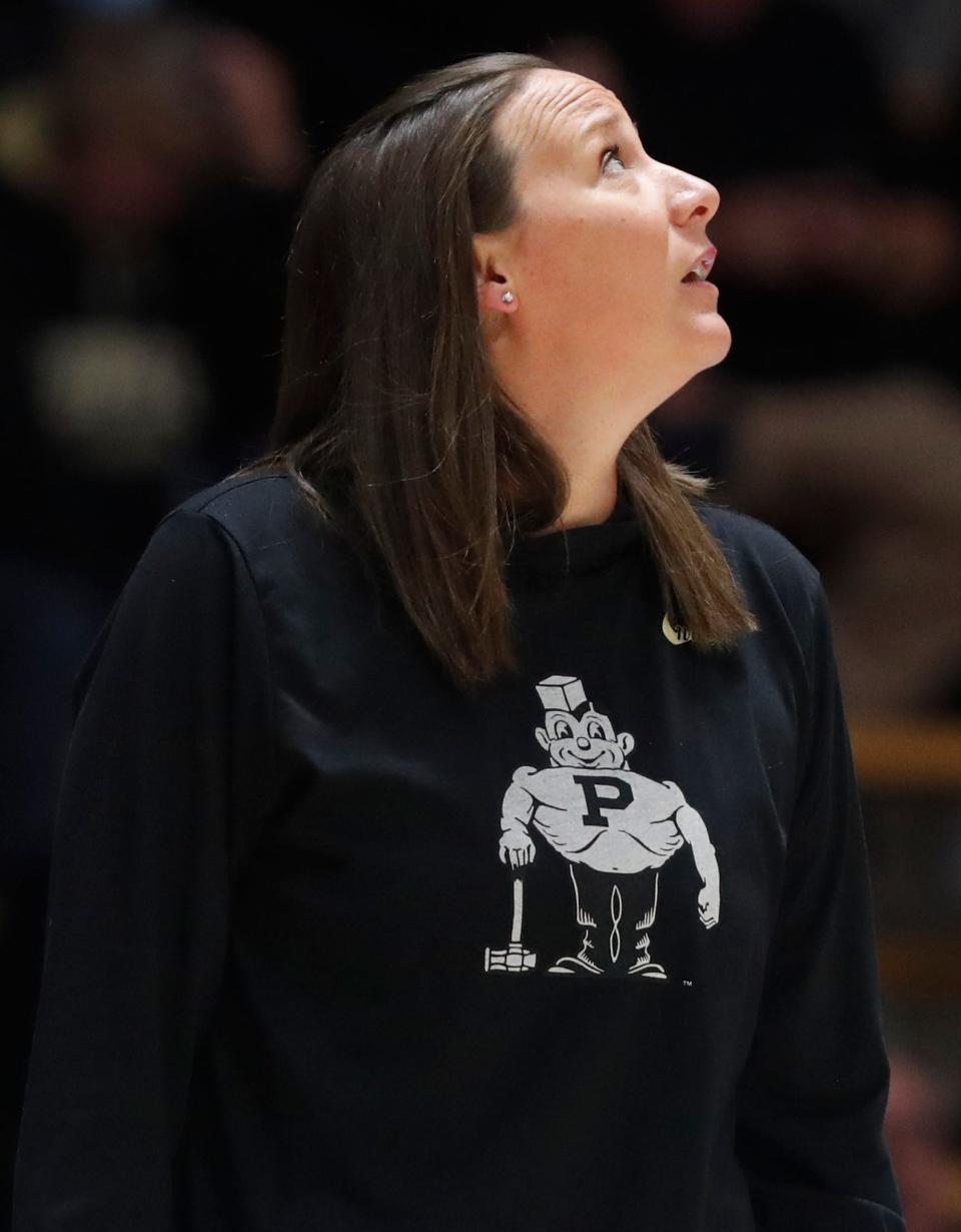 Purdue Boilermakers head coach Katie Gearlds watches a reply on the video screen during the NCAA Big Ten Conference women’s basketball game against the Maryland Terrapins, Thursday, Dec. 8, 2022, at Mackey Arena in West Lafayette, Ind. Maryland won 77-74.