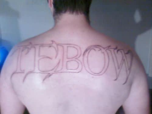 This guy got a tattoo of Tim Tebow's name across his back