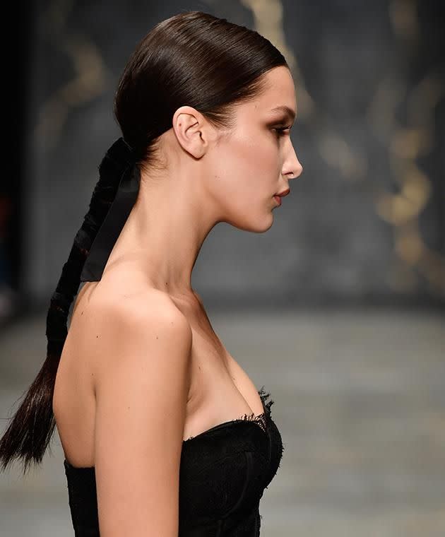 Bella Hadid wore her hair in a sleek ponytail during the Misha show.