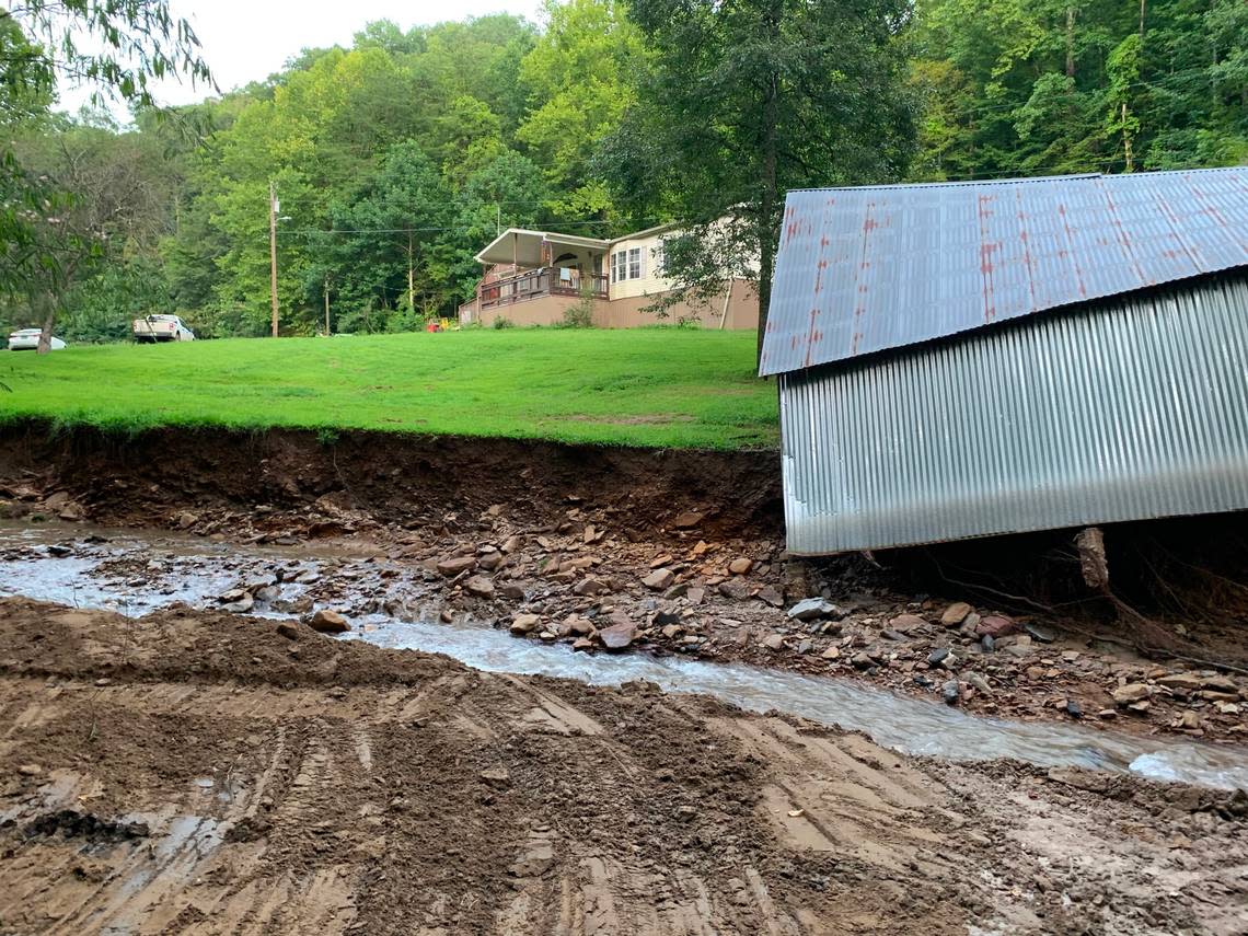 A tiny stream grew large enough and rushed fast enough to rip chunks of sediment out from under this shed near the old Star Fire strip mine site.