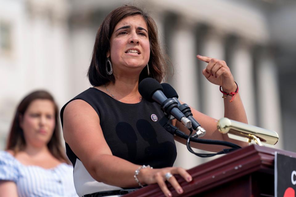 FILE - Rep. Nicole Malliotakis, R-N.Y., accompanied by House Republican Conference chair Rep. Elise Stefanik, R-N.Y., left, speaks at a news conference on the steps of the Capitol in Washington, July 29, 2021. Proposed political maps released by the leaders of New York's Democrat-dominated legislature would give the party an advantage in 22 of of the state's 26 congressional districts and mean re-election trouble for several Republican members of the U.S. House. In New York City, Malliotakis, a Staten Island Republican, would have to run in a district stretched to include some of Brooklyn's most liberal neighborhoods, including the one now home to former New York City Mayor Bill de Blasio. (AP Photo/Andrew Harnik, File)