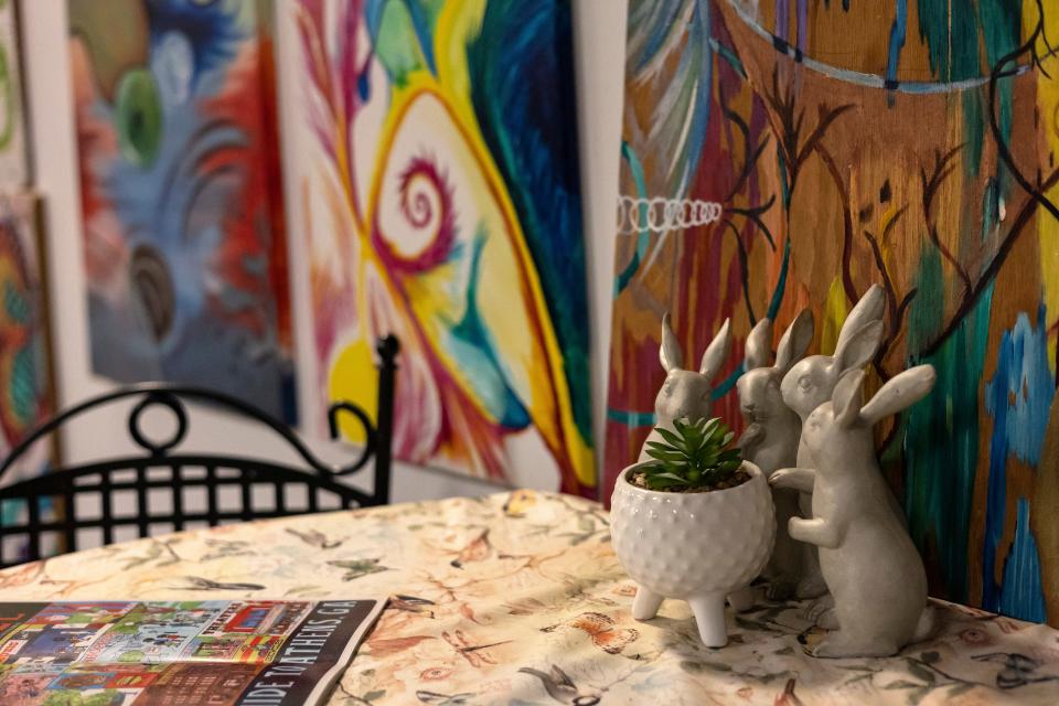 Rabbit Hole Studios, a music and arts community center where artists of all backgrounds can gather to rehearse, record and hold events, is decorated with art and instruments on Monday, Aug. 1, 2022 in Athens.