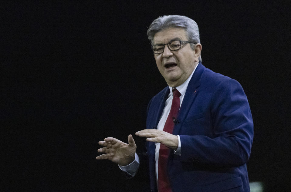 French Far-left presidential candidate for the 2022 election Jean-Luc Melenchon gestures as he speaks during a meeting in Nantes, western France, Sunday, Jan. 16, 2022. Far-left French presidential candidate Jean-Luc Melenchon sought Sunday to reinvigorate his flagging campaign for April's election with an "immersive and olfactory" rally, using 360-degree video and smells diffused through an exhibition hall in the western city of Nantes. (AP Photo/Jeremias Gonzalez)