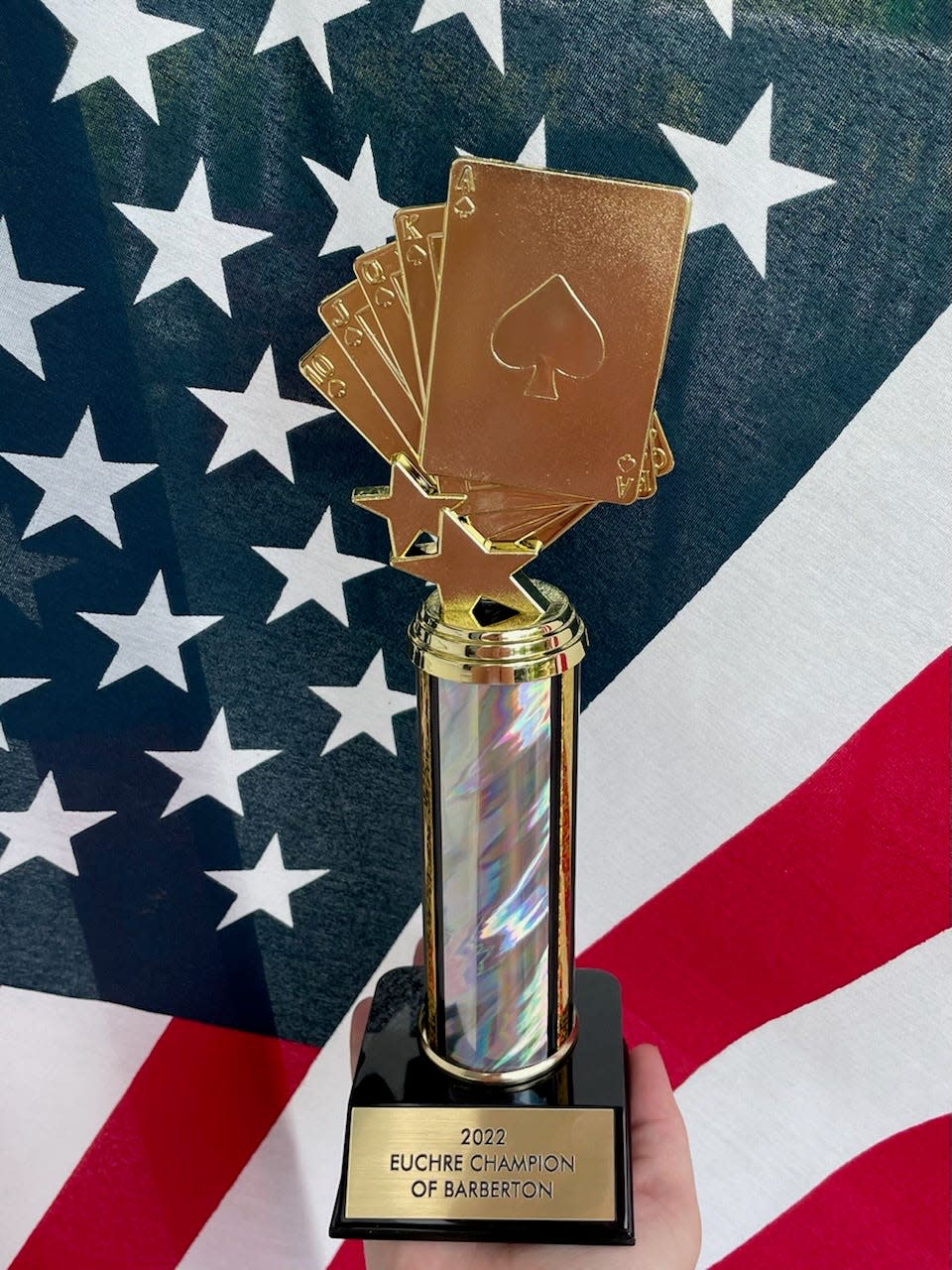 The winning euchre team at the July 19 finals will receive this trophy. [photo courtesy Tayler Thompson]