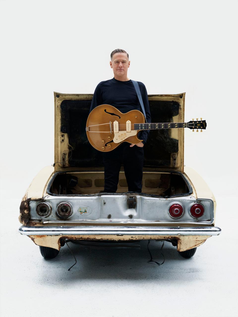 Bryan Adams says he loves the road because of his longstanding relationships with his band and crew.