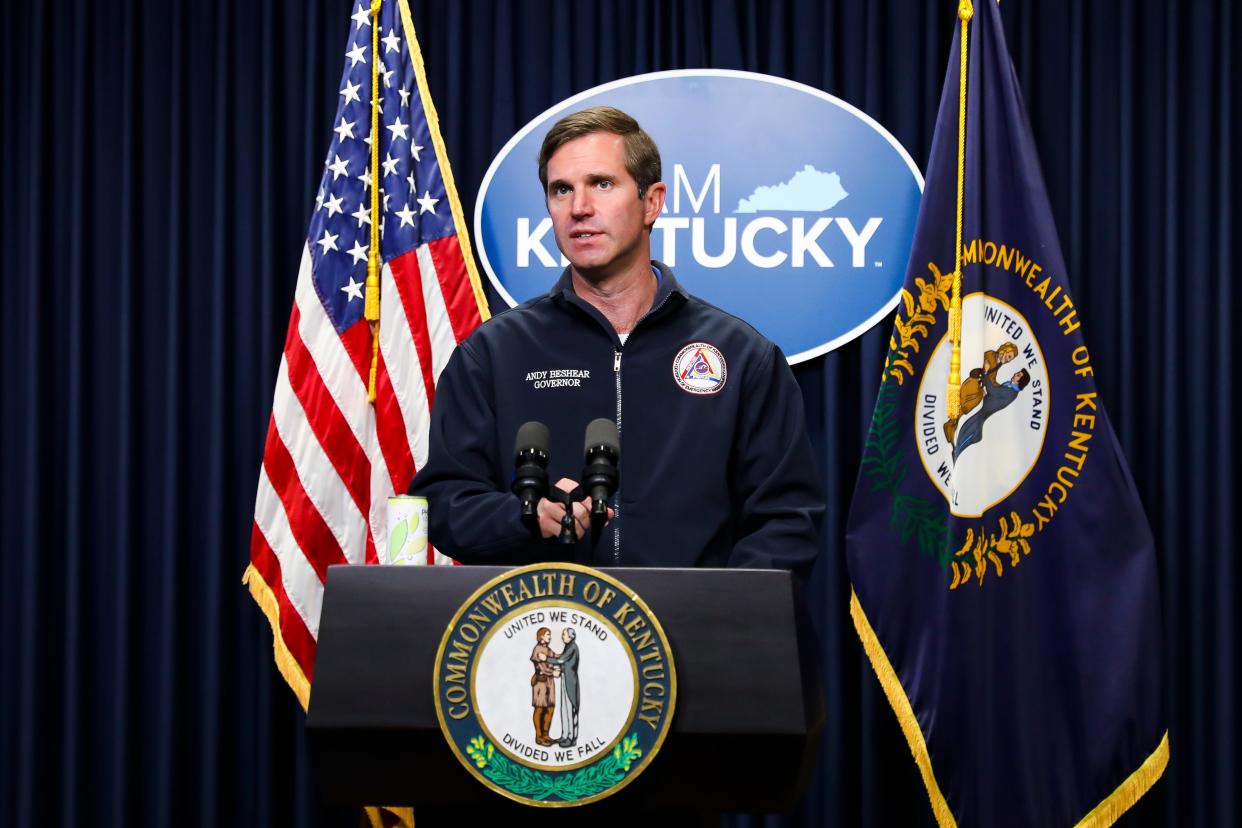 Governor Andy Beshear speaks after touring the Eastern Kentucky region devastated by floods resulting in multiple deaths and loss of property on June 29, 2022.  
