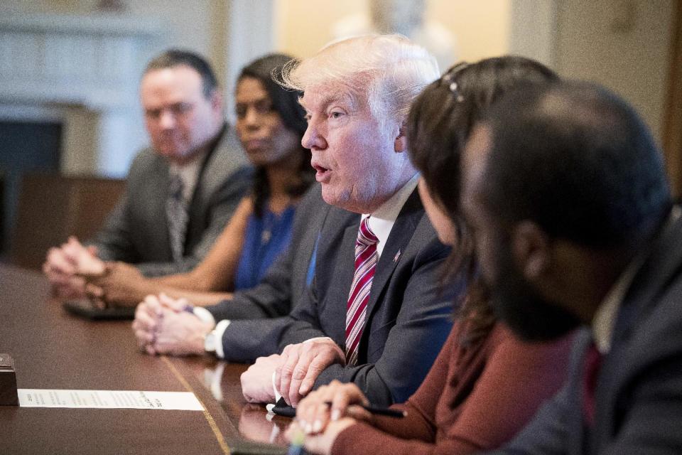 President Donald Trump meets with members of the Congressional Black Caucus in the Cabinet Room of the White House in Washington, Wednesday, March 22, 2017. (AP Photo/Andrew Harnik)