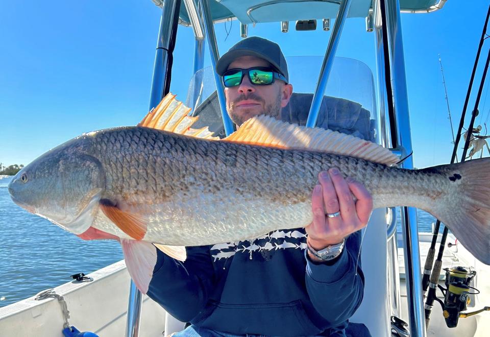 Aaron Bollenbacher, visiting from Arkansas, bagged this healthy redfish last week in Oak Hill, using blue crab.