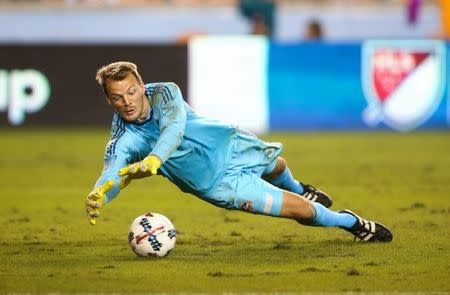 Nov 21, 2017; Houston, TX, USA; Houston Dynamo goalkeeper Joe Willis (31) dives to make a save during the second half against the Seattle Sounders in the first leg of the MLS Western Conference Championship at BBVA Compass Stadium. Troy Taormina-USA TODAY Sports