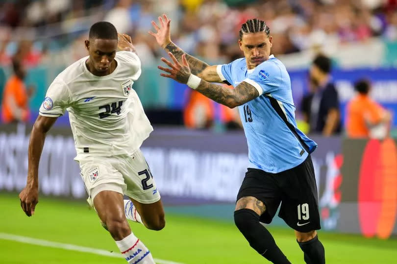 Panama defender Edgardo Fariña (24) and Uruguay forward Darwin Núñez (19) during a match between Panama and Uruguay at Hard Rock Stadium on June 23, 2024 in Miami Gardens, Florida.