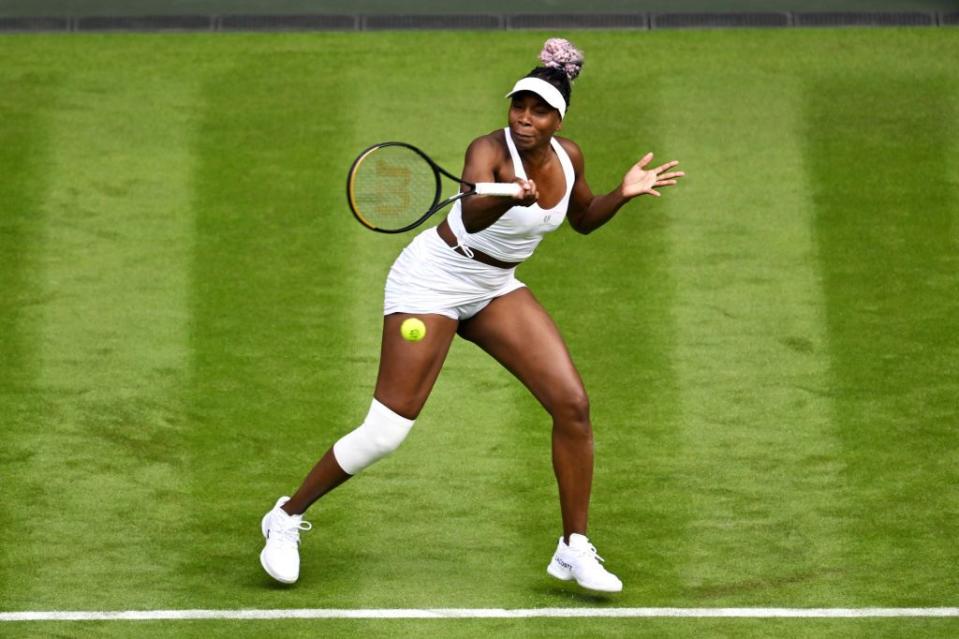 london, england july 03 venus williams of united states plays a forehand against elina svitolina of ukraine in the womens singles first round match on day one of the championships wimbledon 2023 at all england lawn tennis and croquet club on july 03, 2023 in london, england photo by shaun botterillgetty images