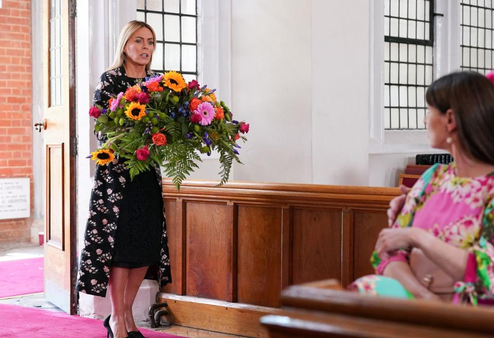 eastenders patsy kensit as emma harding at lola's funeral as other characters look on