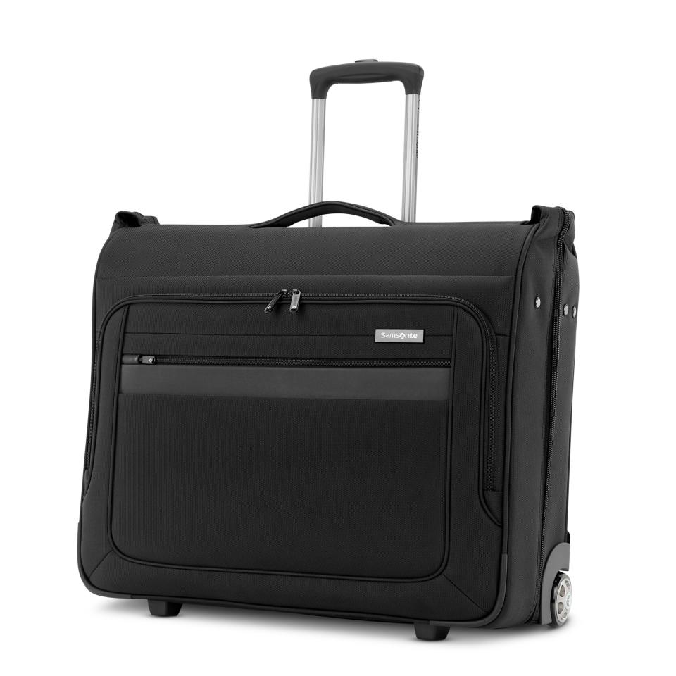 <p><strong>Samsonite</strong></p><p>samsonite.com</p><p><strong>$289.99</strong></p><p><a href="https://shop.samsonite.com/ascella-3.0-2-wheel-garment-bag/1450571041.html" rel="nofollow noopener" target="_blank" data-ylk="slk:Shop Now;elm:context_link;itc:0" class="link ">Shop Now</a></p><p>Breeze through a week away with this wheeled garment bag. The check-sized option offers ample space for suits, dresses, and other hanging attire, pouches for shoes and toiletries, and comes with an over-door hanger so you can hang the whole bag upright in your closet, no unpacking necessary.</p>