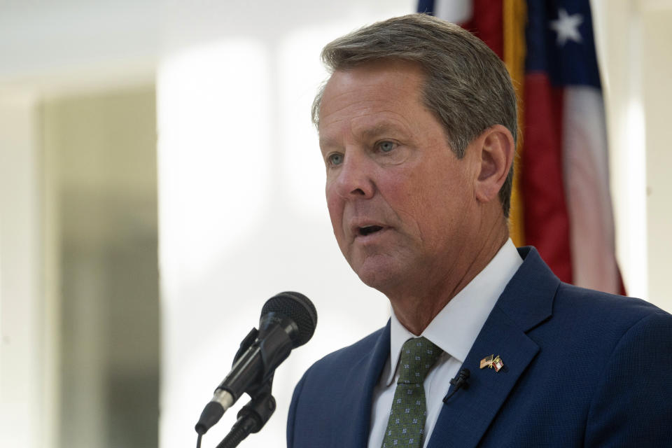 FILE - Georgia Gov. Brian Kemp speaks at Ola High School July 29, 2022, in McDonough, Ga. The shadow of Donald Trump's tampering with the 2020 election in Georgia lands differently for the various Republicans running for office in 2022. (AP Photo/Megan Varner, File)