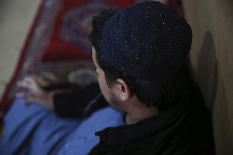 In this Saturday, Dec. 14, 2019, photo, Jailed Taliban who identified himself as Maulvi Sahab, 24, speaks during an interview with The Associated Press inside the Pul-e-Charkhi jail in Kabul, Afghanistan. Thousands of Taliban prisoners jailed as insurgents see a peace deal being hammered out in Qatar as their ticket to freedom. Prisoner release is a key pillar of any agreement the U.S. strikes with the Taliban to end Afghanistan’s 18-year war. (AP Photo/Rahmat Gul)
