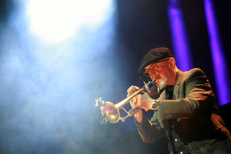 Polish jazz trumpeter Tomasz Stanko performs during the concert commemorating the 70th anniversary of Warsaw Uprising in Warsaw, Poland, July 26, 2014. Picture taken July 26, 2014. Agencja Gazeta/Przemek Wierzchowski via REUTERS