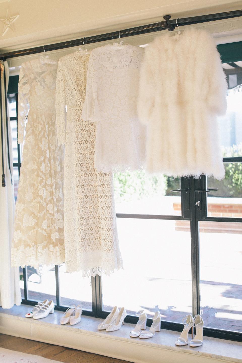 My incredible trio of Valentino dresses and Happy Isles faux-feather coat all ready to go for the ceremony, dinner, and party.