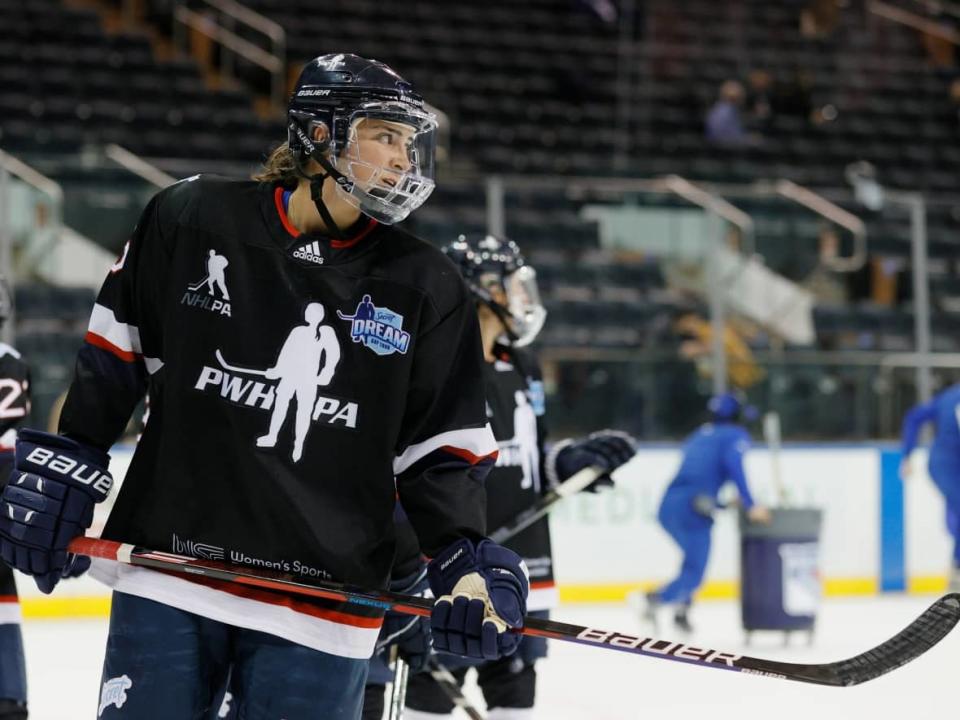 A Professional Women's Hockey Players Association (PWHPA) jersey is visible in a file photo from 2021. Player's from the PWHPA are involved in anti-racism learning and other forms of continuous education with Dr. Courtney Szto, a racialized female academic. (Sarah Stier/Getty Images - image credit)