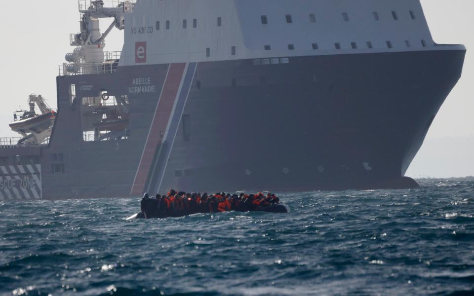 A small boat makes its way across the English Channel this morning