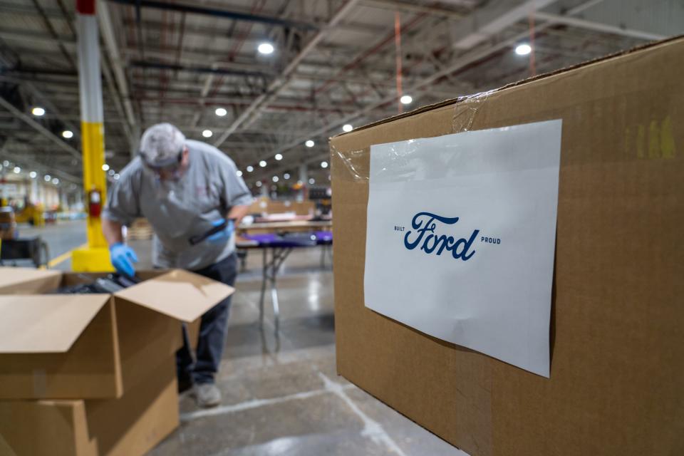 A completed box of protective face shields at Troy Manufacturing Design a Ford subsidiary in Plymouth on Friday, March 27, 2020. Ford, in cooperation with the UAW, will assemble more than 100,000 critically needed plastic face shields per week to help medical professionals, factory workers and store clerks.
 