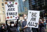 <p>Hundreds rallied in Vancouver, Canada on March 28 and held signs to promote inclusion and allyship.</p>