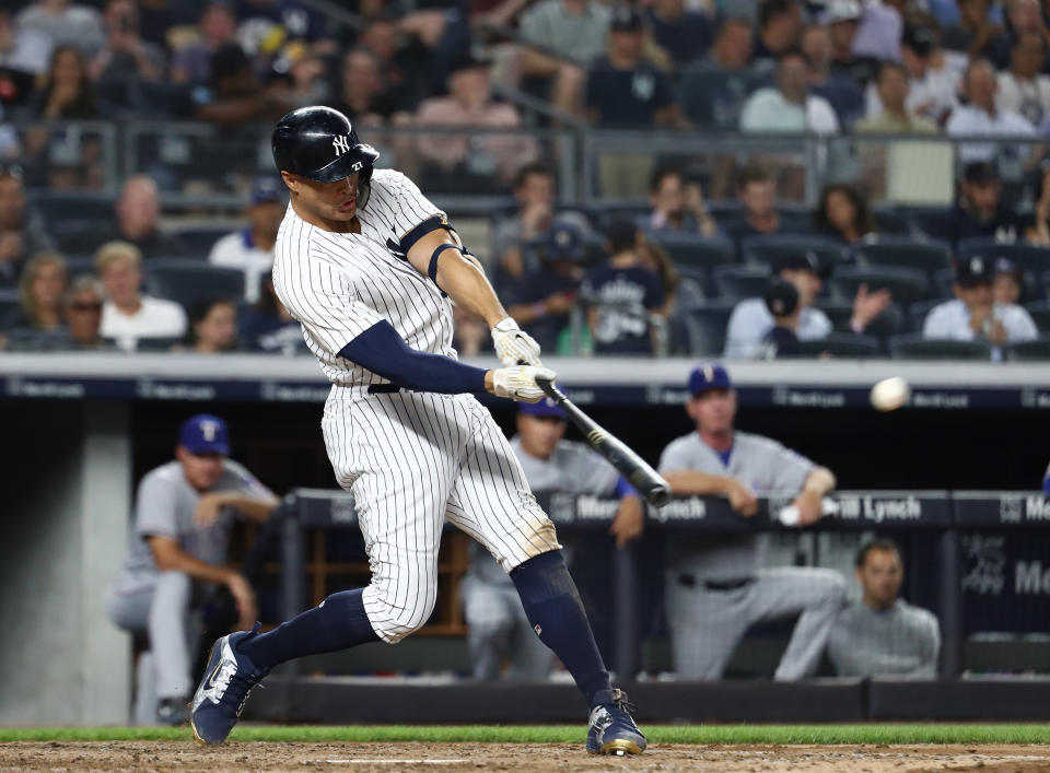 New York Yankees outfielder Giancarlo Stanton hit a home run against the Texas Rangers on Thursday night that was clocked at 121.7 mph. (Getty Images)