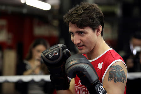 Canadian Prime Minister Justin Trudeau spars in the ring at Gleason's Boxing Gym in the Brooklyn borough of New York, U.S., April 21, 2016. REUTERS/Carlo Allegri